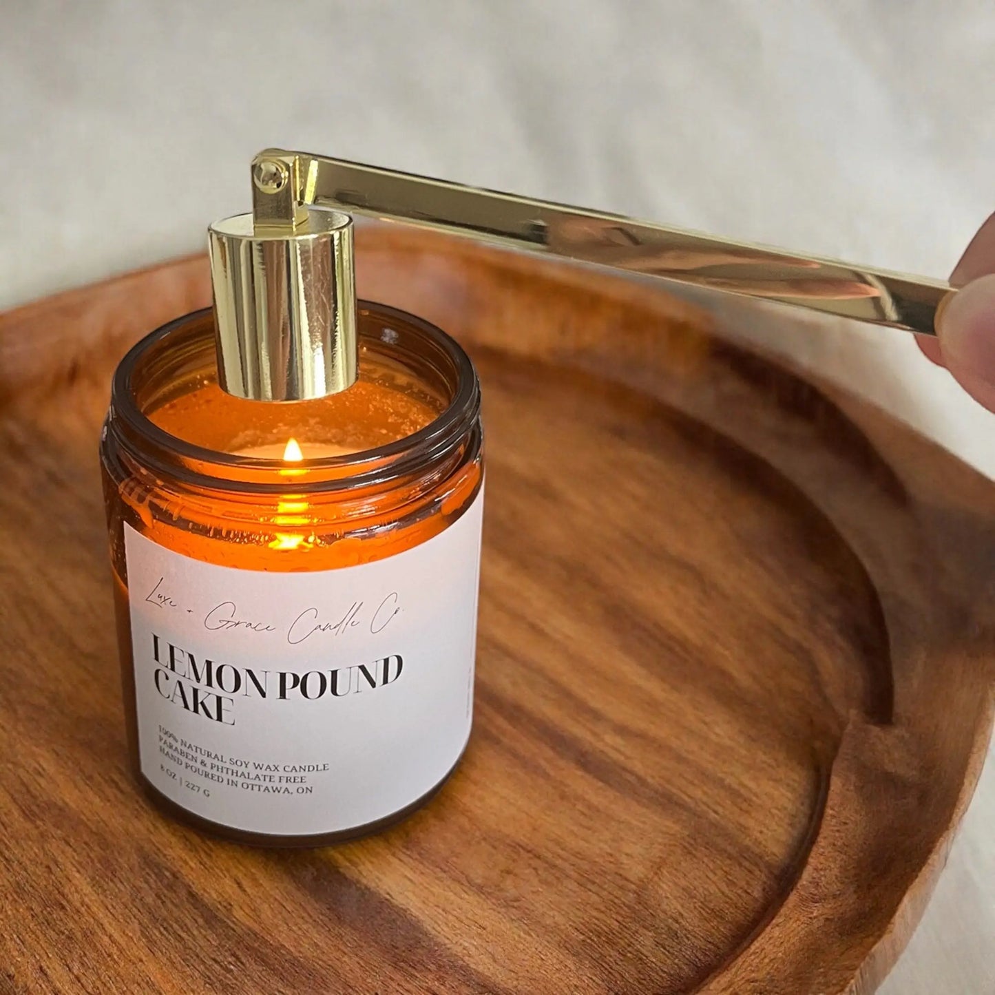 candle snuffer shiny gold